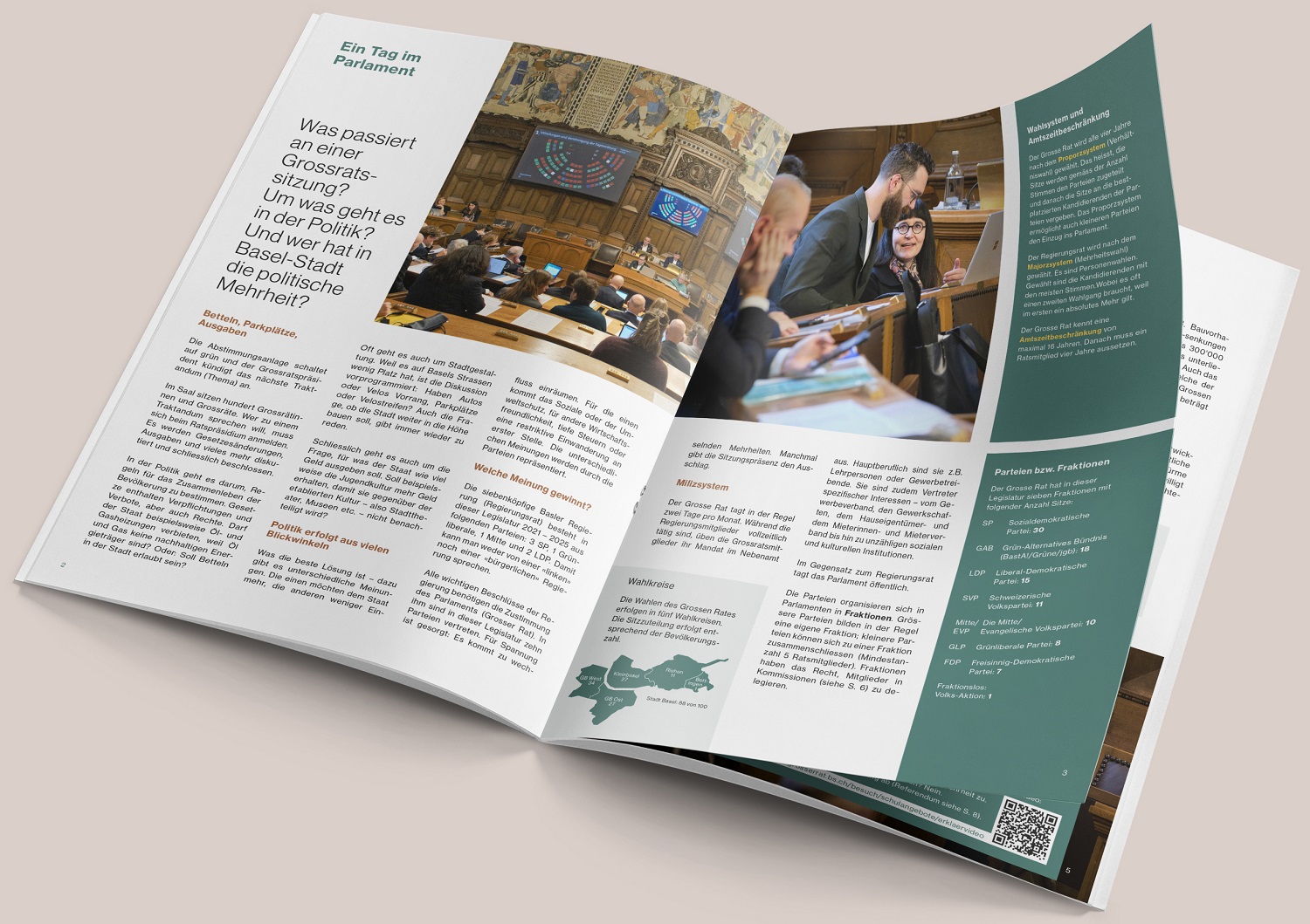 Einblick in die Grossratsbroschüre: Aufgeschlagene Doppelseite mit Text und Bildern des Parlamentsgeschehens